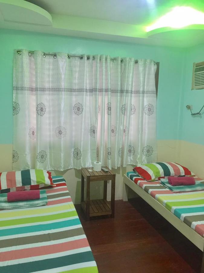 Ace Traveller'S Inn Puerto Princesa ภายนอก รูปภาพ